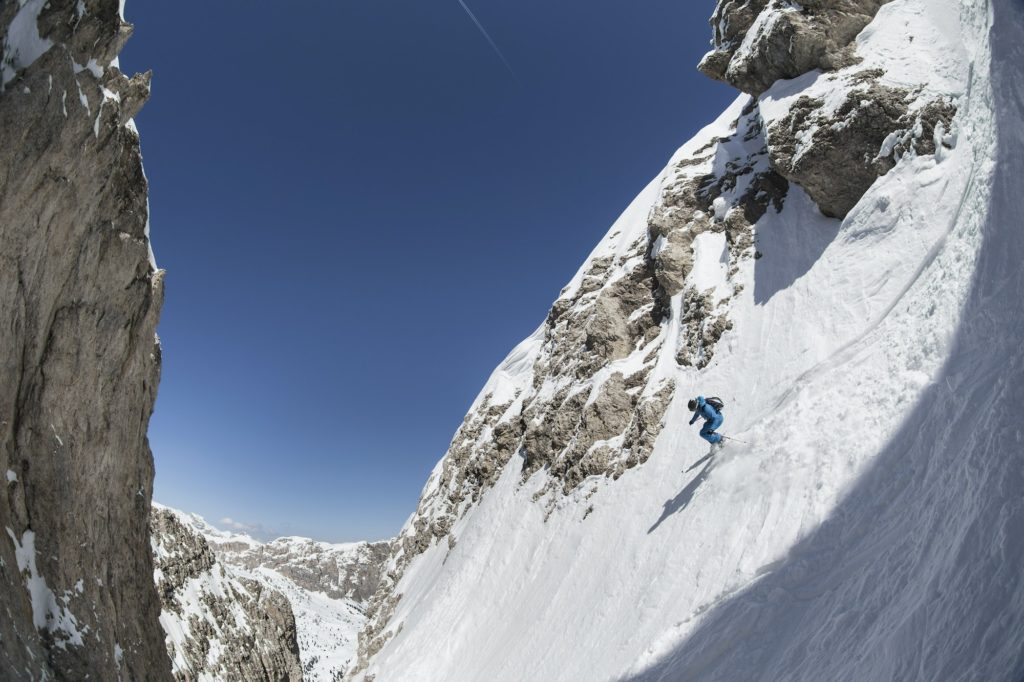Italy, Dolomites, Val Gardena, Man backcountry skiing